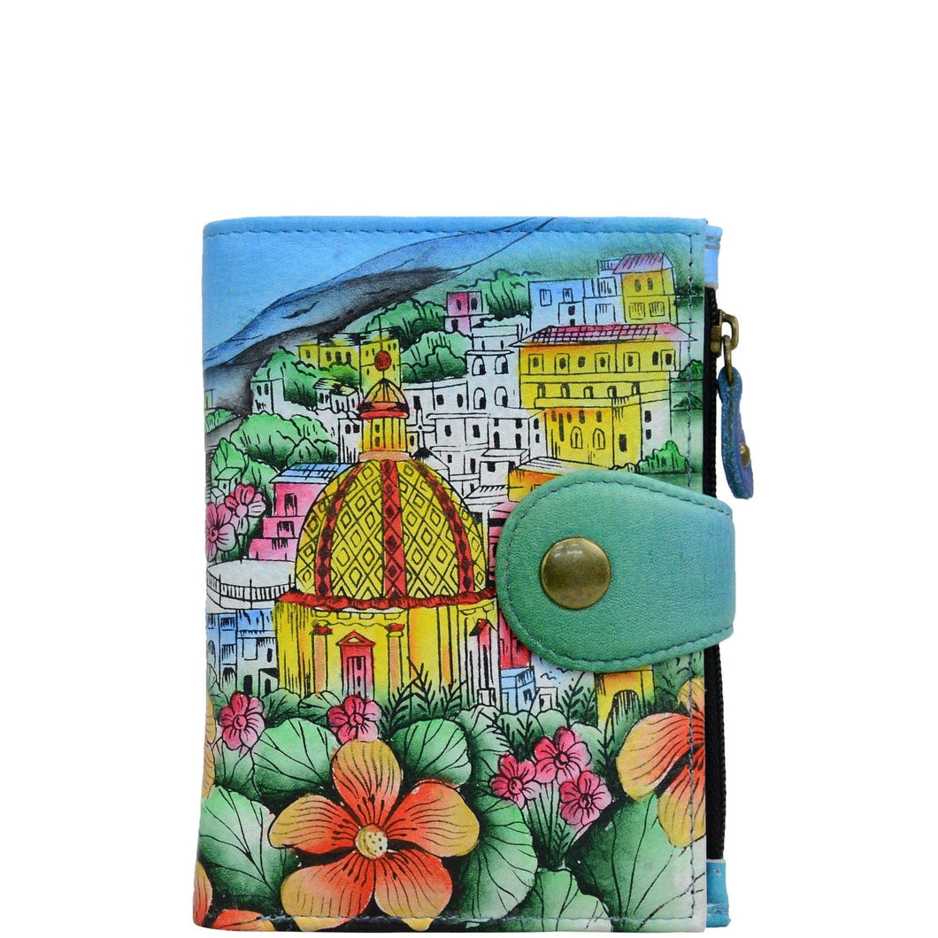Anna by Anuschka style 1700, handpainted Ladies Wallet. Amalfi Dawn painting in Blue color. Featuring full length bill pockets, eight credit card pockets, four multi purpose pockets and zippered coin pocket.