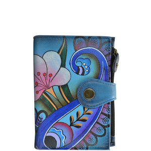 Anna by Anuschka style 1700, handpainted Ladies Wallet. Denim Paisley Floral painting in Blue color. Featuring full length bill pockets, eight credit card pockets, four multi purpose pockets and zippered coin pocket.