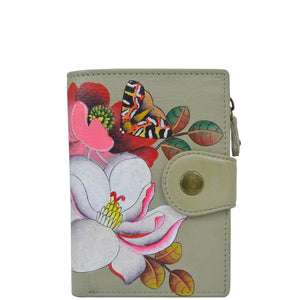 Anna by Anuschka style 1700, handpainted Ladies Wallet. Dreamy Blossoms painting in Grey color. Featuring full length bill pockets, eight credit card pockets, four multi purpose pockets and zippered coin pocket.