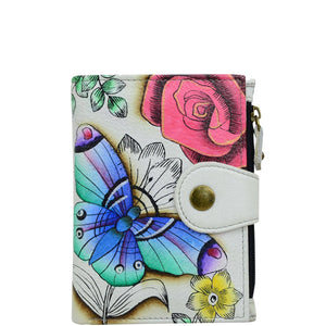 Anna by Anuschka style 1700, handpainted Ladies Wallet. Floral Paradise painting in White color. Featuring full length bill pockets, eight credit card pockets, four multi purpose pockets and zippered coin pocket.