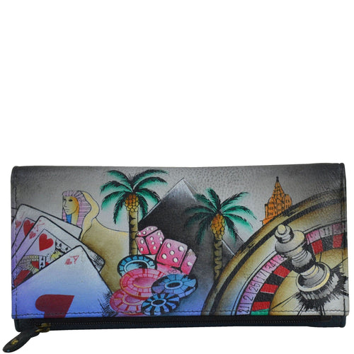 Anna by Anuschka style 1865, handpainted Three Fold Clutch. Sin City painting in black color. Featuring four slip in multipurpose pockets, thirteen credit card holders.