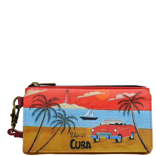 Anna by Anuschka style 1866, handpainted Flap Organizer Wallet. Viva Cuba painting in red/wine color. Featuring built-in organizer and removable strap.