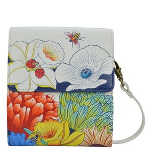 Anna by Anuschka style 1887, handpainted Flap Organizer. Floral Melody painting in white color. Featuring six credit card holders and removable strap.