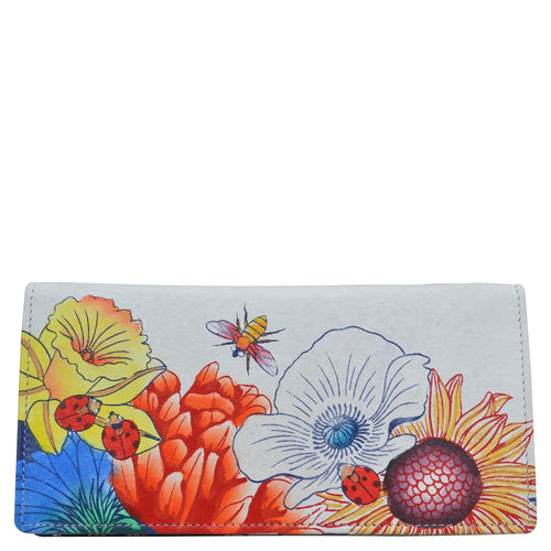 Anna by Anuschka style 1905, handpainted Checkbook Cover. Floral Melody painting in white color. Featuring two fold wallet and card holder and checkbook holder.
