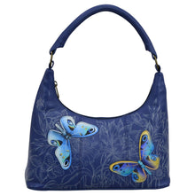 Load image into Gallery viewer, Anuschka style 371, handpainted Medium Zip Top Hobo. Garden of Delight Painting in Blue Color.Inside zippered wall pocket two multipurpose pockets.
