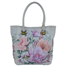 Load image into Gallery viewer, Anuschka style 609, handpainted Tall Tote With Double Handle. Bel Fiori Painted in Grey Color. Featuring one open wall pocket, and two multipurpose pockets with removable fabric cosmetic pouch and optical case.
