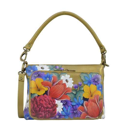 Anuschka style 684, handpainted Large RFID Organizer. Dreamy Floral painting in Gold color. Featuring front all round zippered organizer with RFID protection, ten card holders, one zippered partition pocket with removable rope handle and removable adjustable crossbody strap.