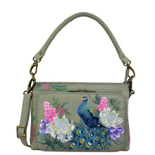 Load image into Gallery viewer, Anuschka style 684, handpainted Large RFID Organizer. Regal Peacock painting in Grey color. Featuring front all round zippered organizer with RFID protection, ten card holders, one zippered partition pocket with removable rope handle and removable adjustable crossbody strap.
