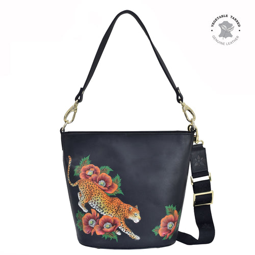 Anuschka style 699, Handpainted Tall Bucket Hobo. Enigmatic Leopard painting in Black color. Featuring Rear full length zip pocket, slip in cell pocket.