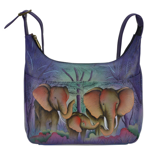 Anna by Anuschka style 7021, handpainted Medium Shopper Bag. Elephant Family painting in green/mint color. Featuring zippered wall pocket, cell & multipurpose pocket, Adjustable handle.