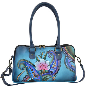 Anna by Anuschka style 8038, handpainted Multi Compartment Satchel. Denim Paisley Floral painting in blue color. Featuring easy access to central compartment with double magnetic snap closure, Removable strap, Fits E-Reader, Fits tablet.