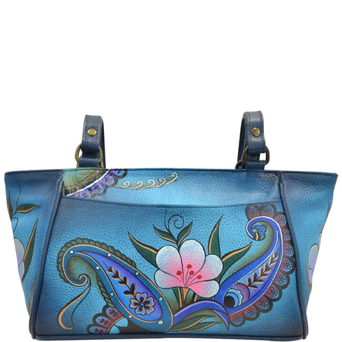 Anna by Anuschka style 8052, handpainted Organizer Tote. Denim Paisley Floral painting in blue color. Featuring built-in organizer, inside zippered wall pocket, two multipurpose pockets, Fits tablet, Fits E-Reader.