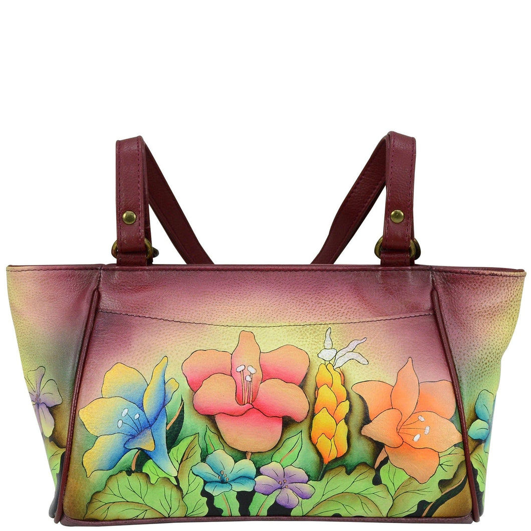 Anna by Anuschka style 8052, handpainted Organizer Tote. Mediterranean Garden painting in multi color. Featuring built-in organizer, inside zippered wall pocket, two multipurpose pockets, Fits tablet, Fits E-Reader.