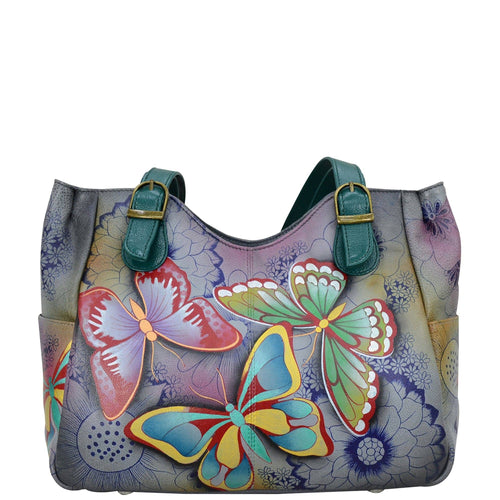 Anna by Anuschka style 8065, handpainted Shoulder Bag. Butterfly Paradise painting in grey color. Featuring inside zippered central partitioned compartment, zippered wall pocket, cell and multi purpose pocket, Fits tablet, Fits E-Reader.