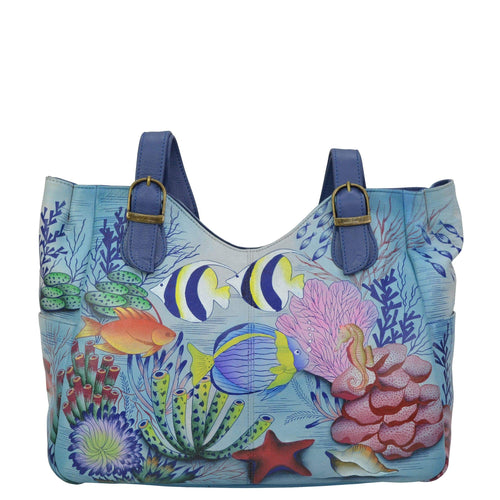 Anna by Anuschka style 8065, handpainted Shoulder Bag. Treasures of the Reef painting in grey color. Featuring inside zippered central partitioned compartment, zippered wall pocket, cell and multi purpose pocket, Fits tablet, Fits E-Reader.