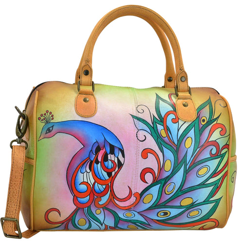 Anna by Anuschka style 8067, handpainted Large Zip Around Satchel. Royal Peacock painting in tan color. Featuring inside zippered wall pocket, cell and multi purpose pocket, Removable strap, Fits Laptop.