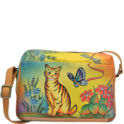 Anna by Anuschka style 8076, handpainted Satchel Organizer. Cat painting in yellow color. Featuring built-in organizer, Rear has a zip around organizer with 4 credit card pockets, 2 multipurpose pockets and 1 ID window, Fits tablet, Fits E-Reader.
