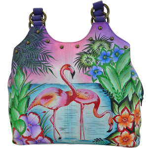 Anna by Anuschka style 8160, handpainted Triple Compartment Medium Satchel. Tropical Flamingos painting in purple color. Featuring two full length outer compartments with magnetic closure, Fits tablet, Fits E-Reader.