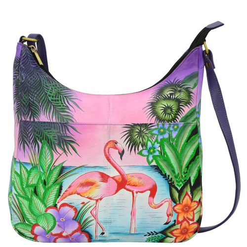 Anna by Anuschka style 8187, handpainted Medium Hobo. Tropical Flamingos painting in purple color. Featuring slip-in front pocket & Rear zippered pocket and slip in cell pocket.