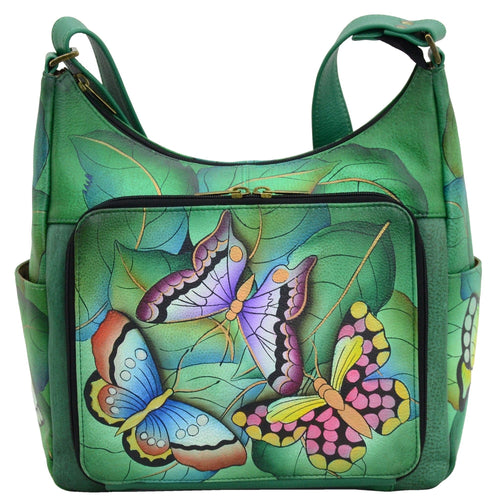 Anna by Anuschka style 8209, handpainted Organizer Hobo. Summer Wings painting in green/mint color. Featuring front all round zippered organizer pocket with five credit card holders, one ID window, two penholders, open pocket, Fits tablet, Fits E-Reader, Built-in organizer.