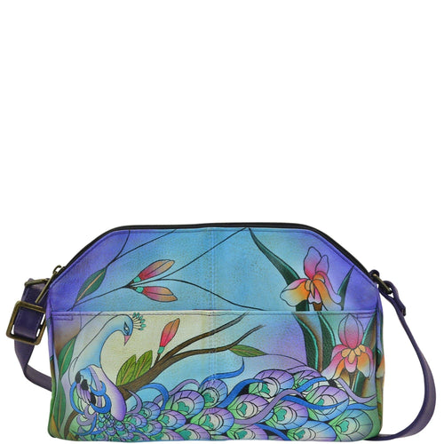 Anna by Anuschka style 8228, handpainted Multi Compartment Crossbody. Midnight Peacock painting in blue color. Featuring two zippered and one Magnetic snap buttoned compartment, Fits E-Reader, Fits tablet.