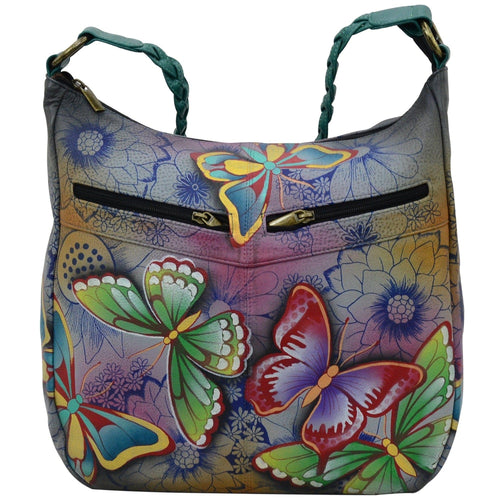 Anna by Anuschka style 8256, handpainted Shoulder Hobo. Butterfly Paradise painting in grey color. Featuring inside one full length zippered wall pocket, one open wall pocket, two multipurpose pockets, Fits Laptop.