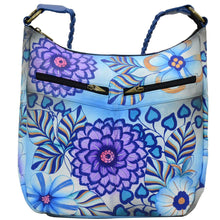 Load image into Gallery viewer, Anna by Anuschka style 8256, handpainted Shoulder Hobo. Summer Bloom Blue painting in blue color. Featuring inside one full length zippered wall pocket, one open wall pocket, two multipurpose pockets, Fits Laptop.
