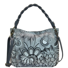 Load image into Gallery viewer, Anna by Anuschka style 8274, handpainted Slim Shoulder Bag. Patchwork Pewter painting in grey color. Featuring inside one full length zippered wall pocket, one open wall pocket, two multipurpose pockets and two vertical zippered pockets.
