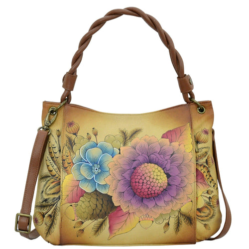 Anna by Anuschka style 8274, handpainted Slim Shoulder Bag. Rustic Bouquet painting in tan color. Featuring inside one full length zippered wall pocket, one open wall pocket, two multipurpose pockets and two vertical zippered pockets.