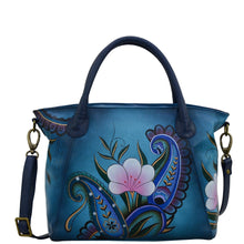 Load image into Gallery viewer, Anna by Anuschka style 8293, handpainted Slouch Tote. Denim Paisley Floral painting in blue color. Featuring fop zip entry to main compartment Inside one zippered wall pocket, Fits E-Reader, Fits tablet.
