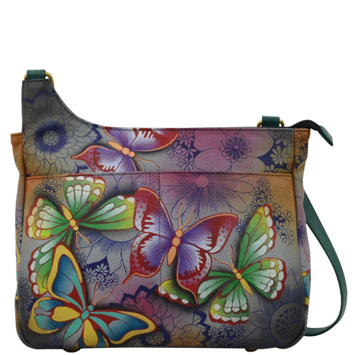 Anna by Anuschka style 8297, handpainted Medium Crossbody. Butterfly Paradise painting in grey color. Featuring two full length slip in pocket in front, Fits E-Reader, Fits tablet, Hands-free.