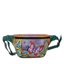 Load image into Gallery viewer, Anna by Anuschka style 8303, handpainted Fanny Pack. Butterfly Paradise painting in tan color. Featuring Inside zippered wall pocket, rear full length zippered pocket with adjustable waist strap.
