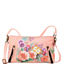 Load image into Gallery viewer, Anna by Anuschka style 8306, handpainted Wide Crossbody Satchel. Vintage Garden painting in pink/peach color. Featuring inside zippered wall pocket, two multipurpose pockets, Removable strap, Fits tablet.
