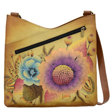 Load image into Gallery viewer, Anna by Anuschka style 8312, handpainted V Top Large Crossbody. Rustic Bouquet painting in tan color. Featuring magnetic snap button entry to main compartment, Fits E-Reader, Fits tablet, Fits Laptop.
