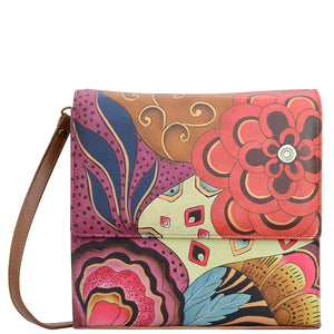 Anna by Anuschka style 8318, handpainted Flap Crossbody Organizer. Tribal Potpourri painting in brown color. Featuring three full length slip in pockets, twelve cc pockets, inside two open and one zippered compartment.