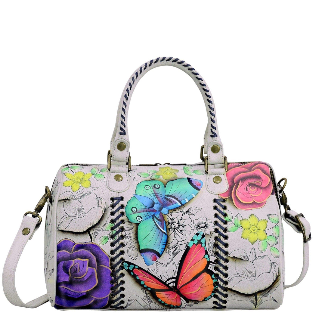 Anna by Anuschka style 8319, handpainted All Round Zip Satchel. Floral Paradise painting in white color. Featuring one zippered wall pocket, two multipurpose pockets and rear full length zippered pocket slip in cell pocket.