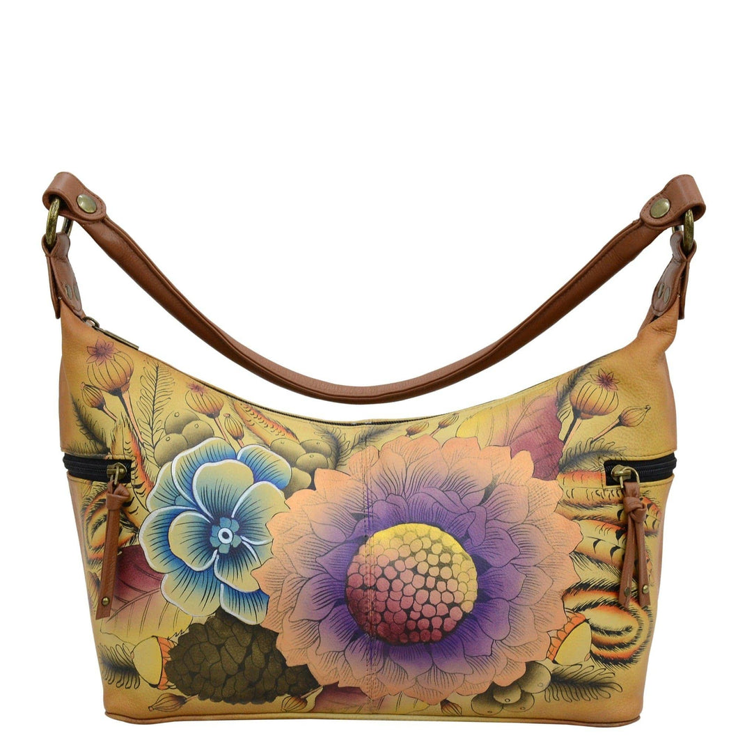 Anna by Anuschka style 8320, handpainted Medium East West Hobo. Rustic Bouquet painting in tan color. Featuring inside zippered wall pocket, two multipurpose pockets and two zippered side pockets.