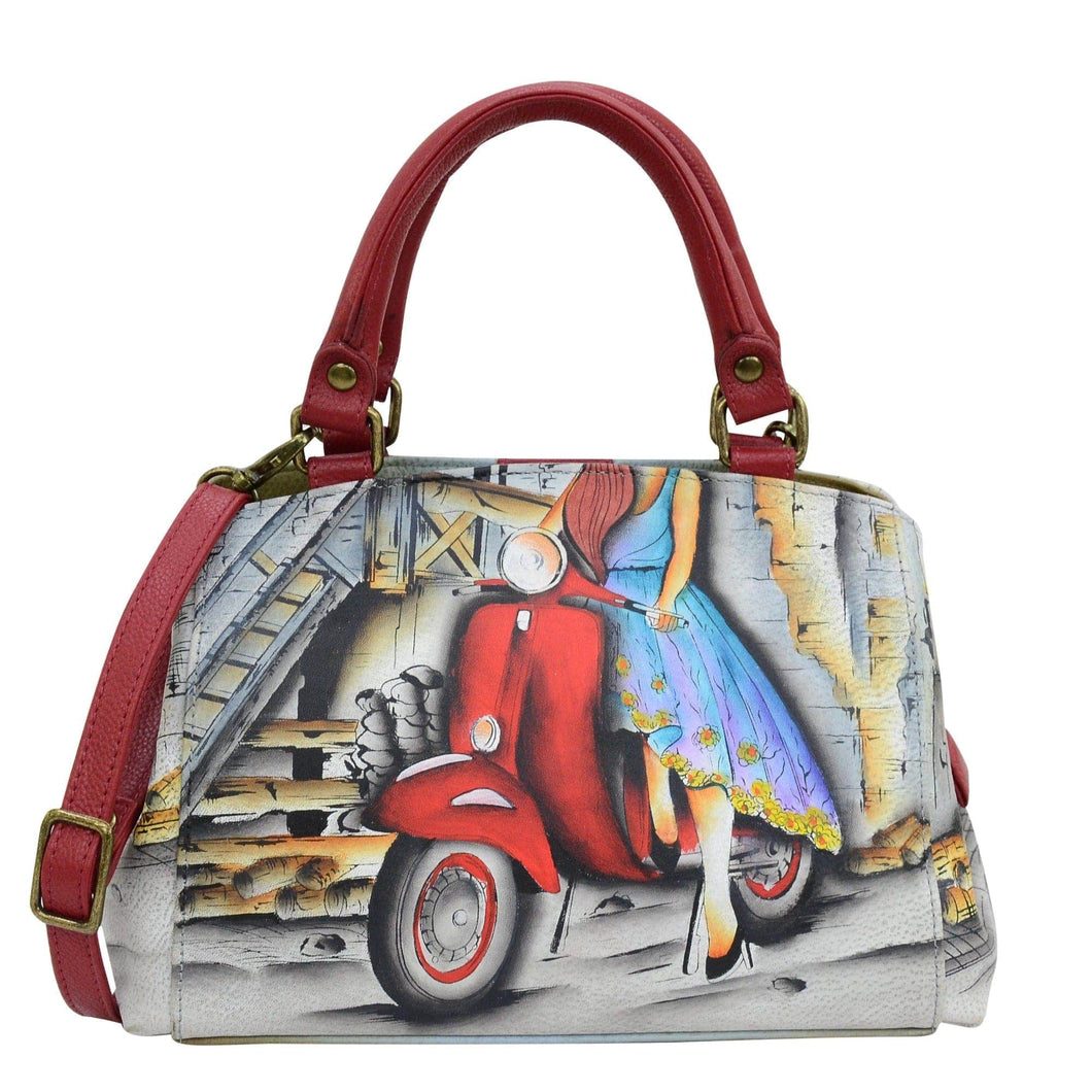 Anna by Anuschka style 8325, handpainted Small Multi Compartment Satchel. Roman Dreams painting in white color. Featuring One zippered central compartment and two open compartment, inside one full length zippered wall pocket two multipurpose pockets and rear full length zippered pocket.