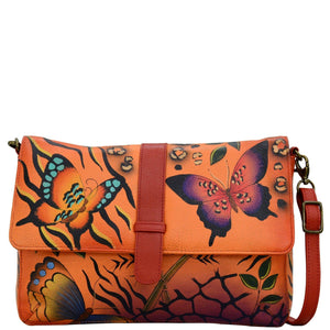 Anna by Anuschka style 8329, handpainted Medium Flap Messenger. Animal Butterfly Tangerine painting in orange color. Featuring Front full length slip in pocket with magnetic snap button, inside full length zippered wall pocket and two multipurpose pockets.