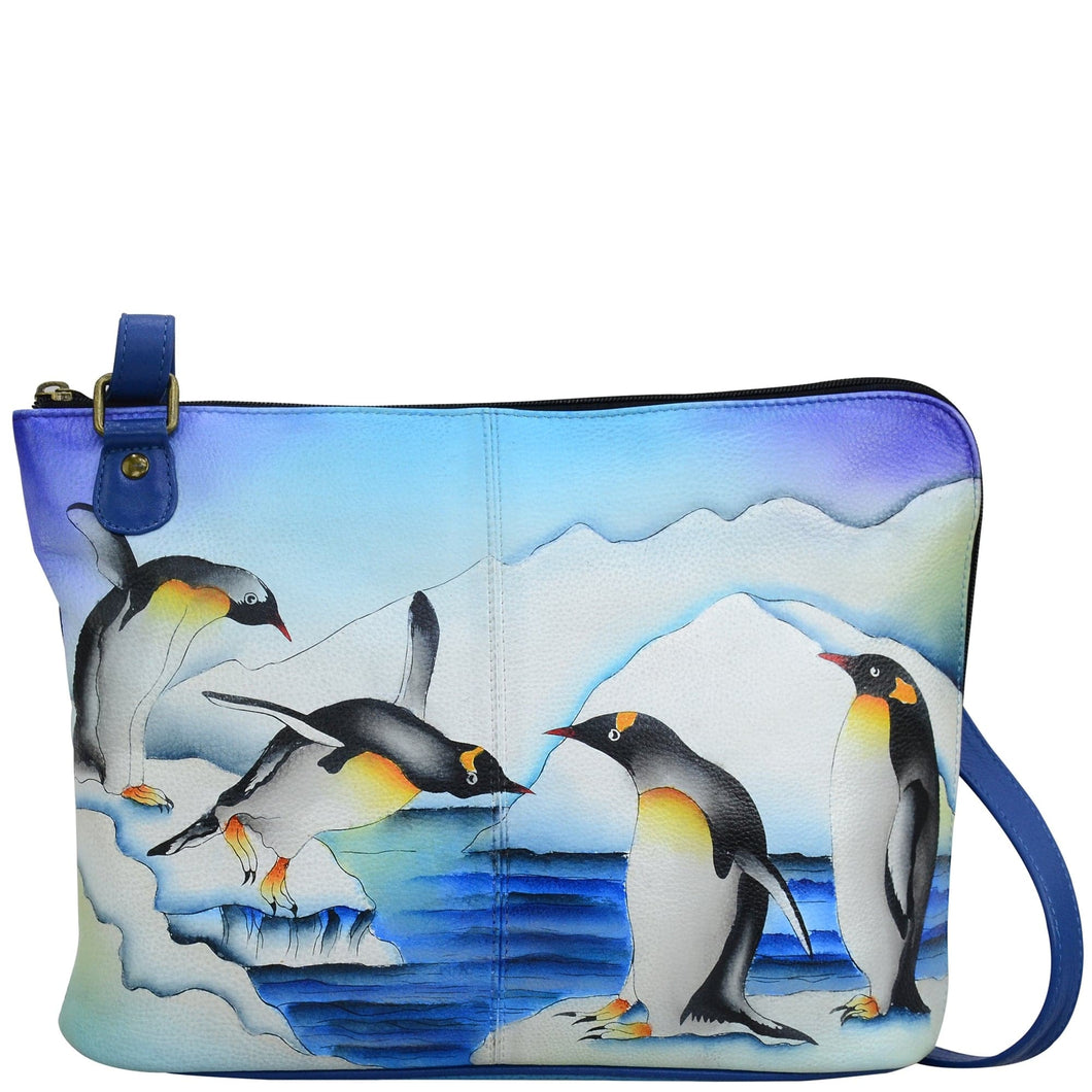 Anna by Anuschka style 8338, handpainted Two-Sided Zip Travel Organizer. Arctic Emperors painting in blue color. Featuring inside zippered partition pocket, zippered wall pocket, open pocket and two multi-purpose pocket, ten credit card holder.
