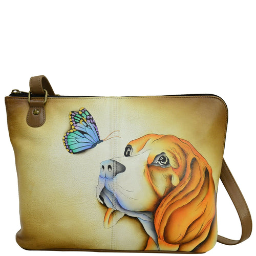 Anna by Anuschka style 8338, handpainted Two-Sided Zip Travel Organizer. Puppy Love painting in brown color. Featuring inside zippered partition pocket, zippered wall pocket, open pocket and two multi-purpose pocket, ten credit card holder.