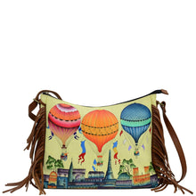 Load image into Gallery viewer, Anna by Anuschka style 8339, handpainted Large Fringed Hobo. Festive Sky painting in yellow color. Featuring one zippered central compartment with four pop up credit card holder and one ID window, inside one full length zippered wall pocket, one open wall pocket and two multipurpose pockets.
