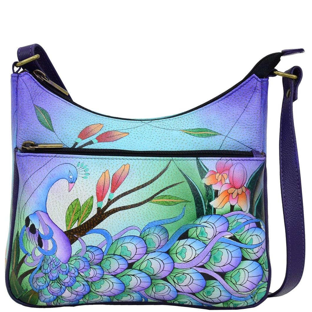 Anna by Anuschka style 8350, handpainted Medium Crossbody Hobo. Midnight Peacock painting in blue color. Featuring inside zippered wall pocket, two multipurpose pockets and front zippered pocket.