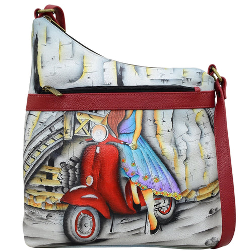 Anna by Anuschka style 8354, handpainted Assymetric Crossbody. Roman Dreams painting in white color. Featuring inside one zippered wall pocket, one open pocket, two multipurpose pockets and front zippered pocket.