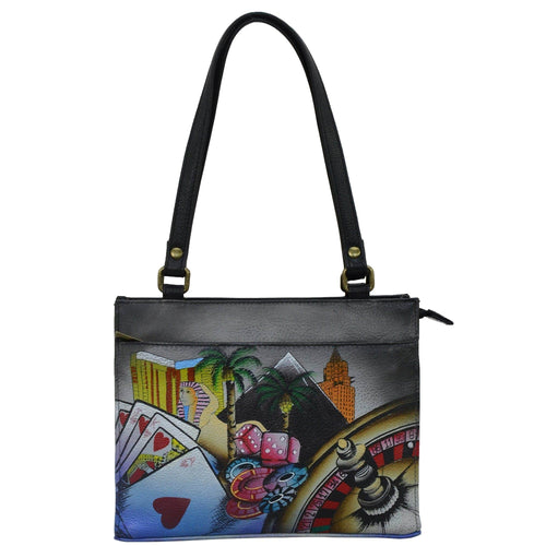 Anna by Anuschka style 8355, handpainted Mini Satchel. Sin City painting in black color. Featuring inside one full length zippered wall pocket, Two multipurpose pockets and front full length zippered wall pocket.