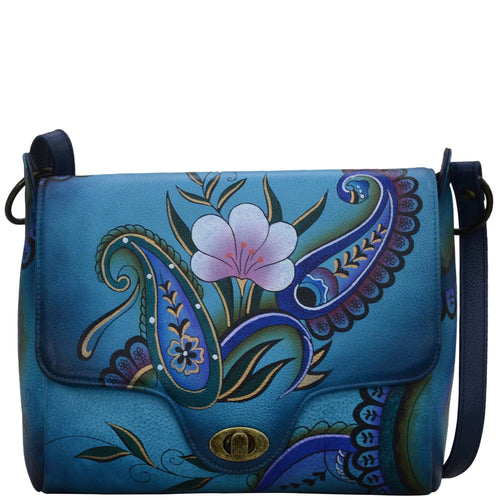 Anna by Anuschka style 8357, handpainted Flap Messenger. Denim Paisley Floral painting in blue color. Featuring inside one zippered wall pocket, two multipurpose pockets and one slip in wall pocket under flap.