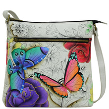 Load image into Gallery viewer, Anna by Anuschka style 8374, handpainted Large Crossbody. Floral Paradise painting in white color. Featuring Front full length zippered pocket and inside one zippered wall pocket, one open wall pocket two multipurpose pockets.
