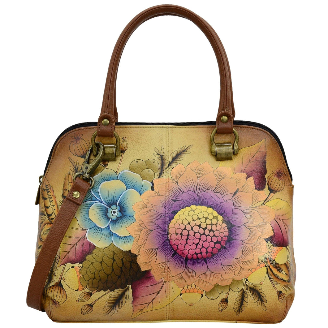 Anna by Anuschka style 8375, handpainted Medium Satchel. Rustic Bouquet painting in tan color. Featuring Inside one zippered wall pocket, one open wall pocket, two multipurpose pockets and rear full length zippered pocket, slip in cell pocket.