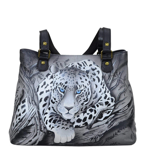 Anna by Anuschka style 8397, handpainted Shoulder Satchel. African Leopard painting in black color. Featuring inside two multipurpose pockets with gusset, one zippered wall pocket and one open wall pocket.