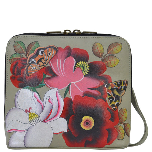 Anna by Anuschka style 8476, handpainted Small Zip Around Crossbody. Dreamy Blossoms painted in Grey color. Featuring One zippered partition pocket and one multipurpose pockets with gusset.​